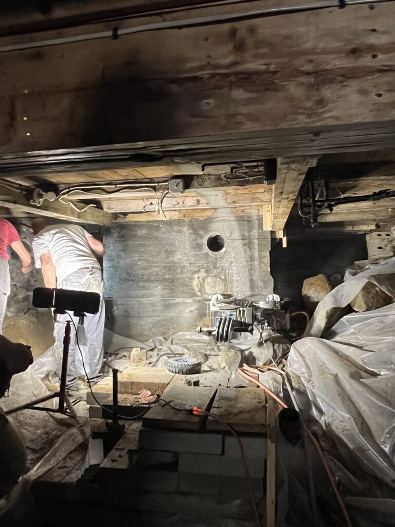 Vin Porcella of NH Concrete Cutting uses new saw to slice through our very large chimney